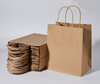 Wholesales Custom Logo Printed Recycled Packaging Shopping Gift Bag Kraft Paper Bag with Flat Handles